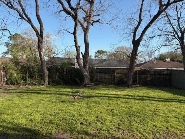 view of yard with fence