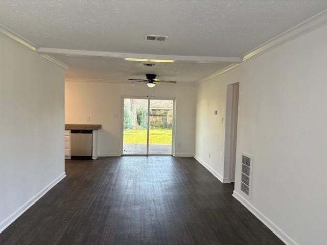 unfurnished living room with visible vents, baseboards, dark wood-style flooring, and crown molding