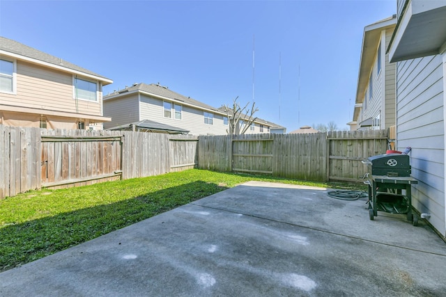 view of yard with a fenced backyard and a patio