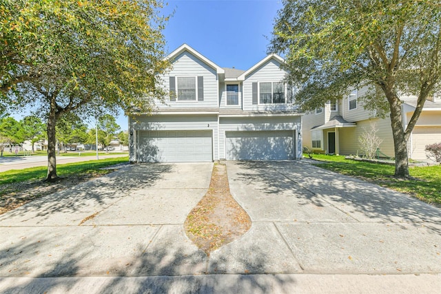 view of front facade featuring concrete driveway and an attached garage