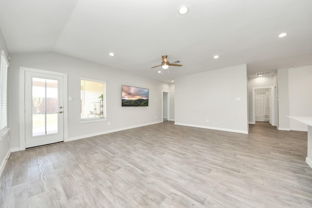 unfurnished living room with light wood finished floors, visible vents, lofted ceiling, recessed lighting, and a ceiling fan