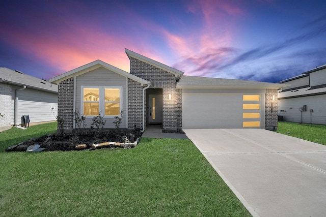 view of front of property featuring concrete driveway, an attached garage, and brick siding