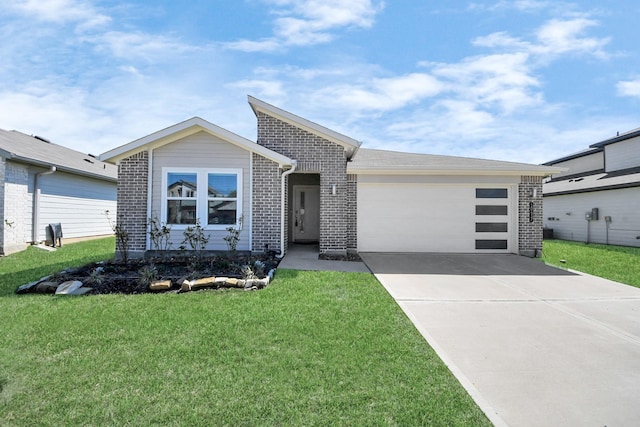 view of front of property with driveway, brick siding, an attached garage, and a front lawn