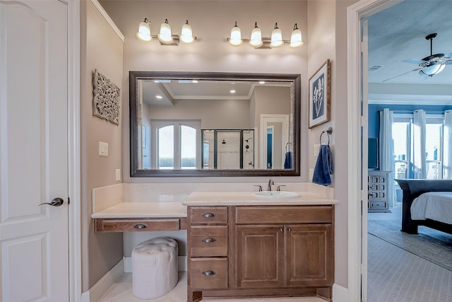 bathroom featuring a shower stall, connected bathroom, ceiling fan, ornamental molding, and vanity