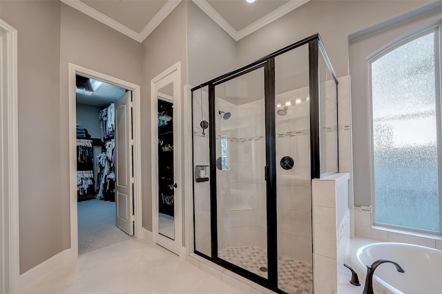 full bath with a garden tub, a stall shower, a spacious closet, and ornamental molding