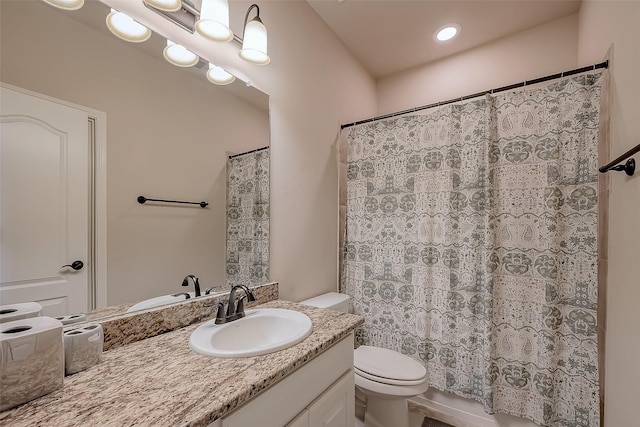 bathroom with a shower with shower curtain, recessed lighting, toilet, and vanity