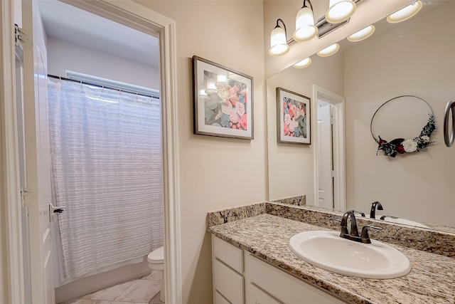 full bath featuring toilet and vanity