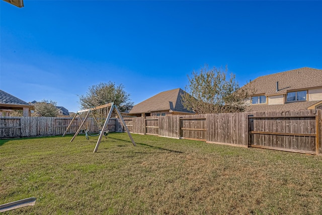 view of yard featuring a fenced backyard