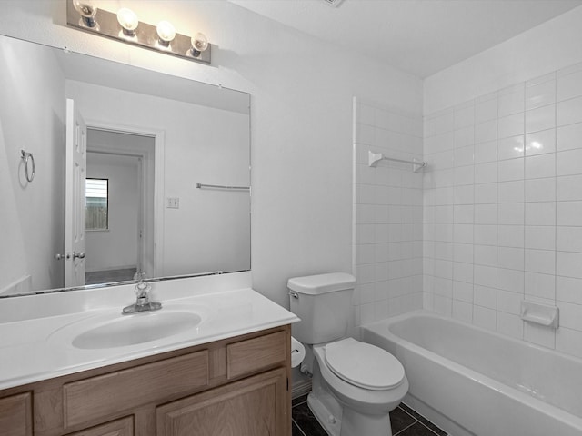 full bathroom featuring tub / shower combination, toilet, and vanity