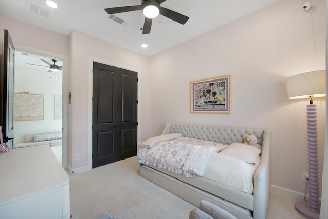 bedroom featuring recessed lighting, visible vents, light colored carpet, and baseboards