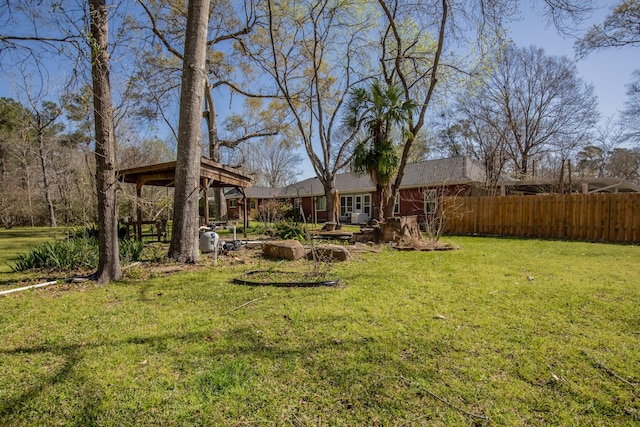 view of yard with fence