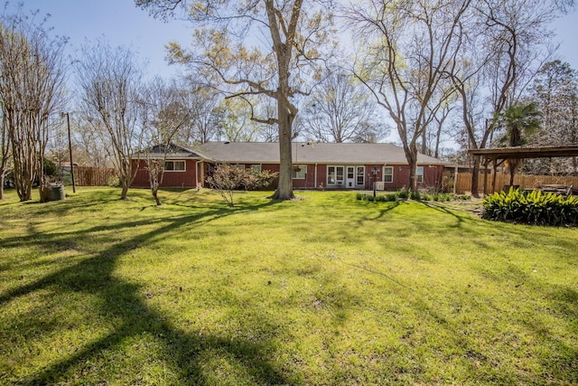 view of yard with fence