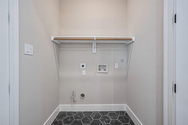 washroom featuring baseboards, laundry area, hookup for a washing machine, hookup for a gas dryer, and electric dryer hookup