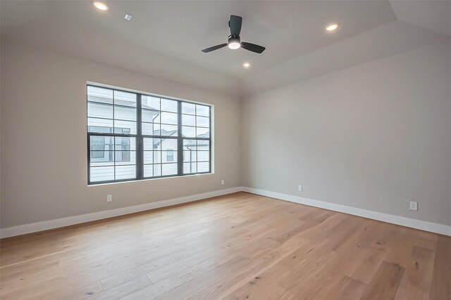 empty room with recessed lighting, baseboards, light wood-type flooring, and ceiling fan