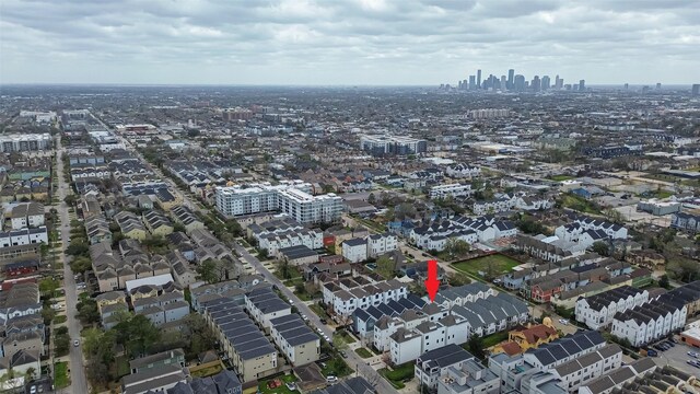 drone / aerial view featuring a city view