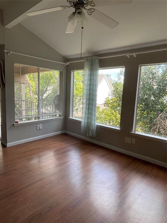 12400 Overbrook Ln Unit 45C, Houston, TX 77077 - unfurnished dining area featuring healthy amount of natural light, vaulted ceiling, ceiling fan, baseboards, and wood finished floors