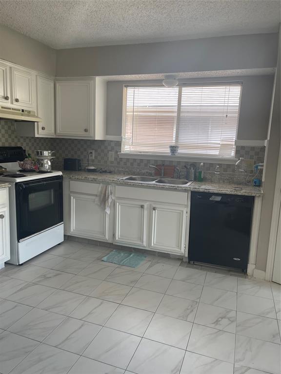 12400 Overbrook Ln Unit 45C, Houston, TX 77077 - kitchen featuring range with electric cooktop, black dishwasher, a sink, under cabinet range hood, and tasteful backsplash