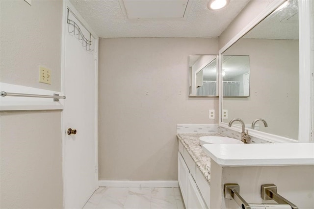 12400 Overbrook Ln Unit 45C, Houston, TX 77077 - bathroom featuring vanity and marble look tile flooring