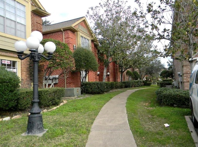 12400 Overbrook Ln Unit 45C, Houston, TX 77077 - view of community with a yard