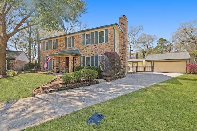 colonial house with a front yard, brick siding, a garage, and a chimney