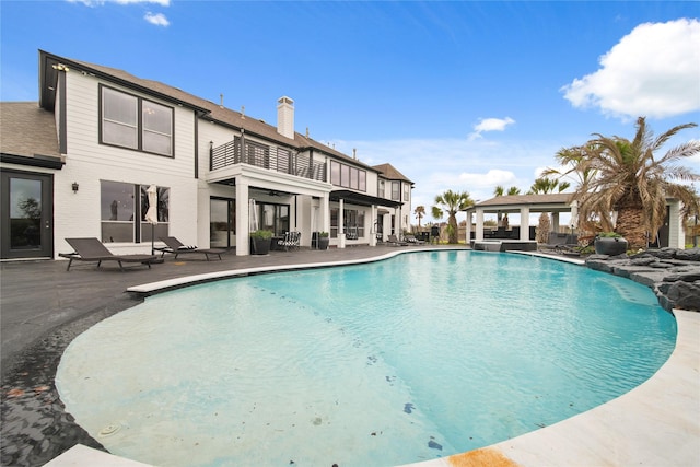 pool with a patio area