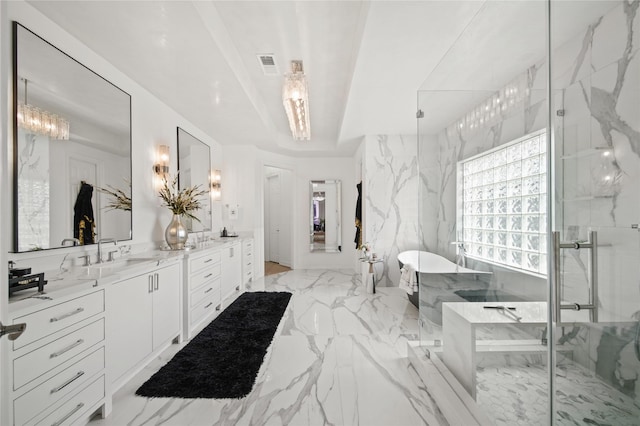 full bathroom featuring a marble finish shower, visible vents, a freestanding tub, marble finish floor, and vanity