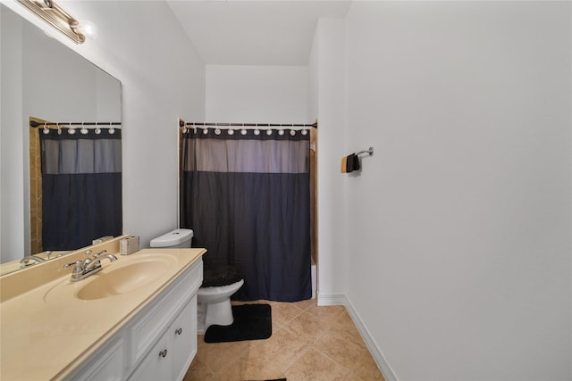 full bath featuring tile patterned flooring, toilet, vanity, and baseboards