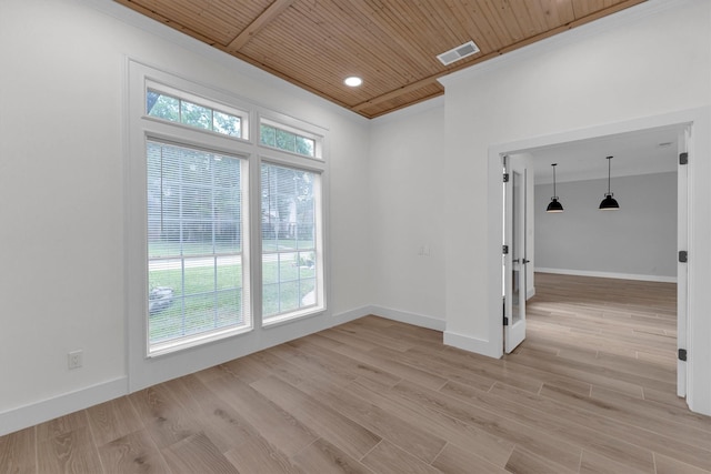 unfurnished room featuring visible vents, light wood-style flooring, wooden ceiling, and baseboards