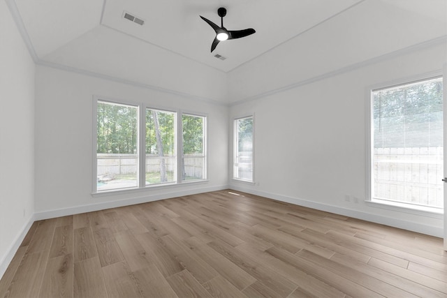 spare room with baseboards, a ceiling fan, visible vents, and light wood-type flooring