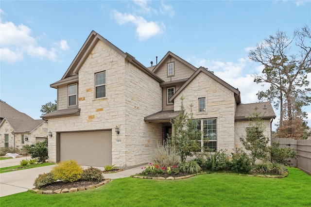 view of front of property featuring an attached garage, a shingled roof, a front lawn, fence, and driveway