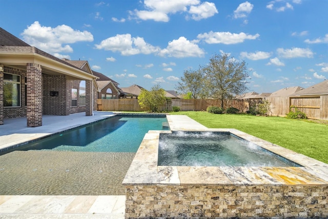 view of swimming pool with a fenced in pool, a lawn, a fenced backyard, an in ground hot tub, and a patio