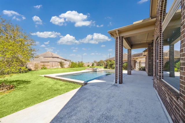 view of pool with a patio area, fence, a lawn, and a fenced in pool