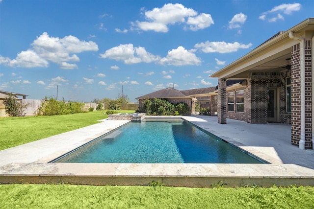 view of pool featuring a patio, a yard, a fenced backyard, and a fenced in pool