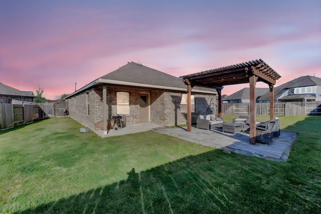 back of house at dusk with outdoor lounge area, a patio, a lawn, and a pergola