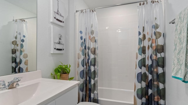 full bathroom with toilet, vanity, and shower / bathtub combination with curtain