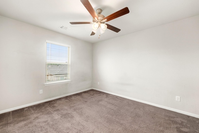 unfurnished room featuring a ceiling fan, baseboards, visible vents, and carpet floors