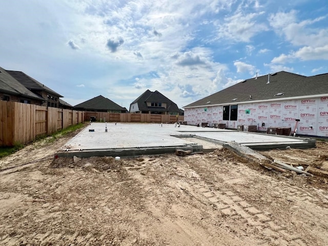 view of yard featuring a patio area and fence