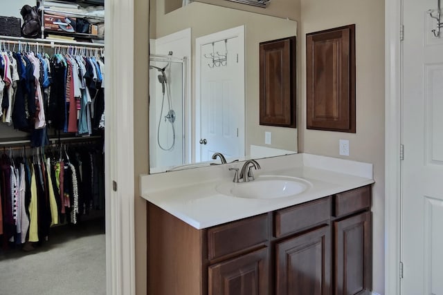 16815 Coronado Springs Dr, Spring, TX 77379 - full bath featuring vanity, a walk in closet, and walk in shower