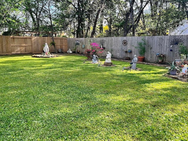 16815 Coronado Springs Dr, Spring, TX 77379 - view of yard featuring a fenced backyard
