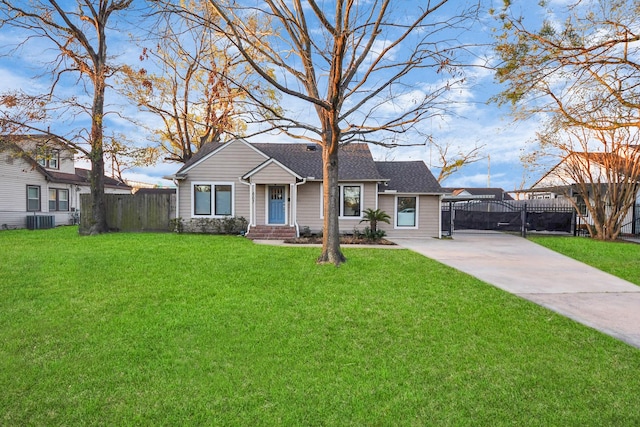 view of front facade with a front yard, fence, a shingled roof, a chimney, and central air condition unit