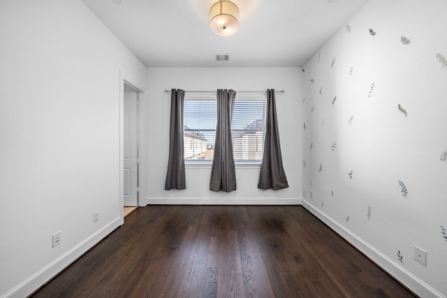 2721 Maxroy St, Houston, TX 77007 - unfurnished room with visible vents, baseboards, and wood finished floors