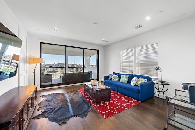 2721 Maxroy St, Houston, TX 77007 - living room featuring visible vents, recessed lighting, and wood finished floors
