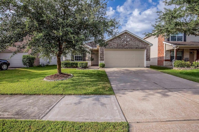 view of front of house with a front yard, a garage, brick siding, and concrete driveway