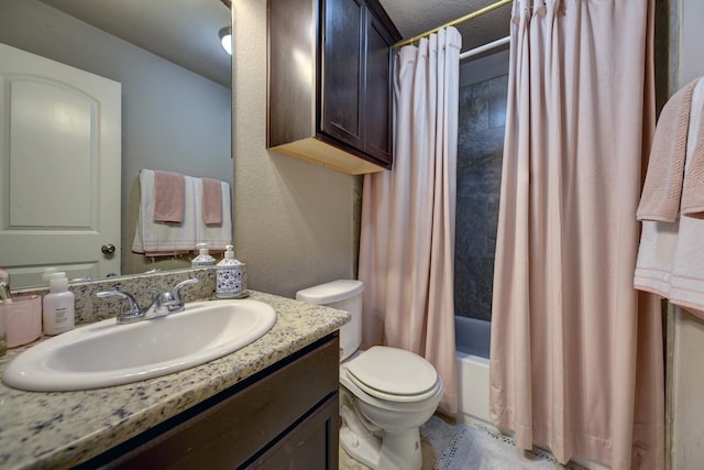 bathroom with vanity, toilet, and shower / tub combo with curtain