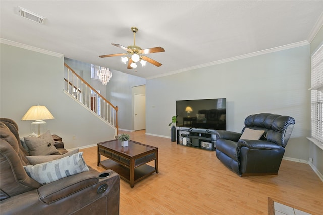 living room with visible vents, stairway, crown molding, light wood finished floors, and baseboards