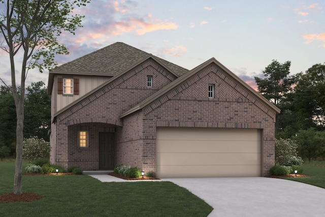view of front of home featuring brick siding, concrete driveway, and board and batten siding