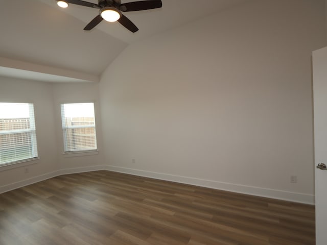8035 Kay Harbor Dr, Cypress, TX 77433 - spare room with lofted ceiling, dark wood-style floors, and a ceiling fan