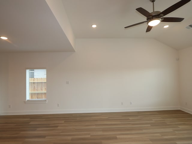8035 Kay Harbor Dr, Cypress, TX 77433 - spare room with recessed lighting, wood finished floors, ceiling fan, and lofted ceiling