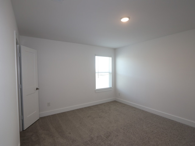 8035 Kay Harbor Dr, Cypress, TX 77433 - empty room featuring carpet floors and baseboards