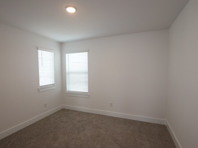 8035 Kay Harbor Dr, Cypress, TX 77433 - carpeted spare room featuring baseboards